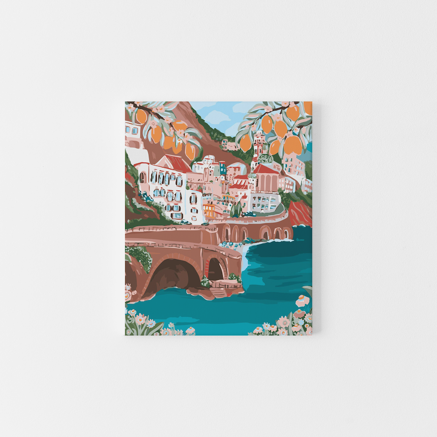 Paint Like Frida’s Where Sunshine Meets Citrus Big Framed Canvas — a vibrant paint by numbers artwork of a coastal Italian village with terracotta rooftops, lemon trees, and turquoise water, framed in a custom wooden floating frame.